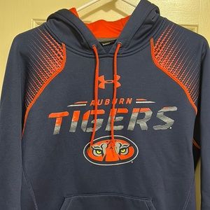 Auburn University Under Armour hoodie size small. Orange and blue in color.